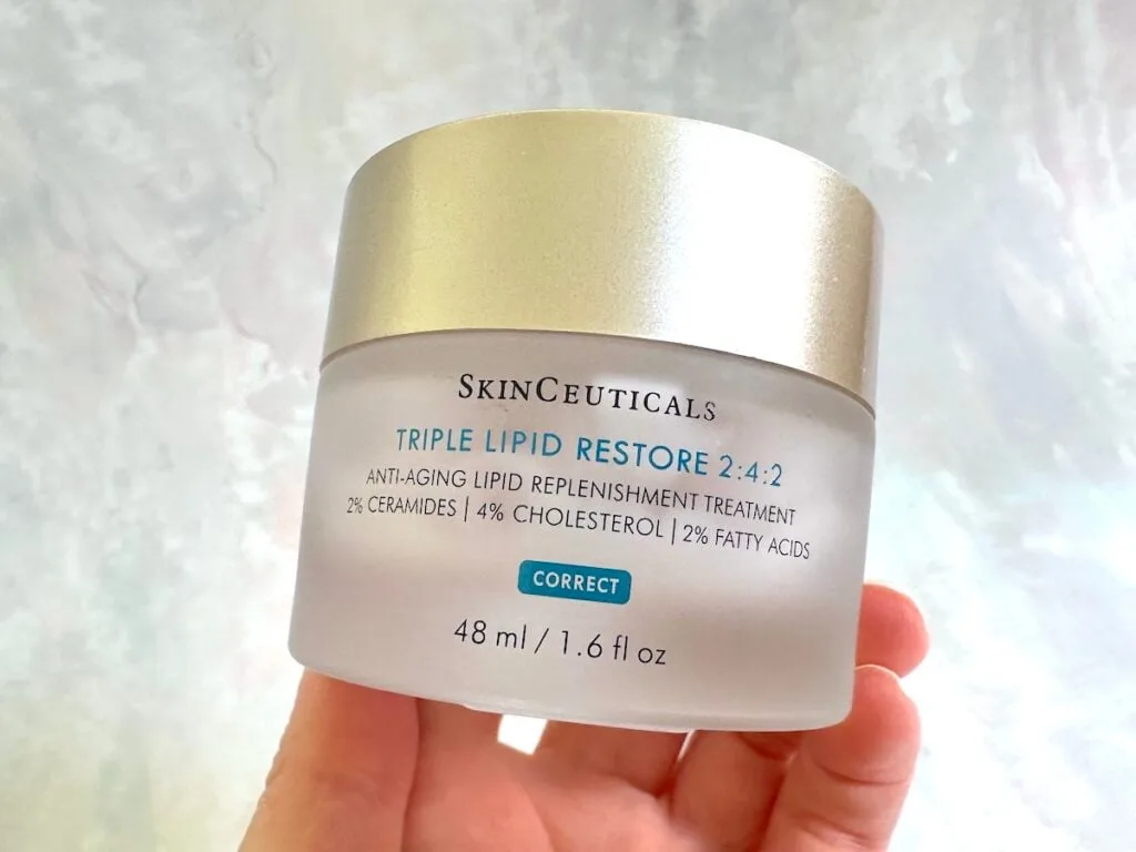 SkinCeuticals Triple Lipid Restore 2:4:2 Anti-Aging Treatment, handheld.