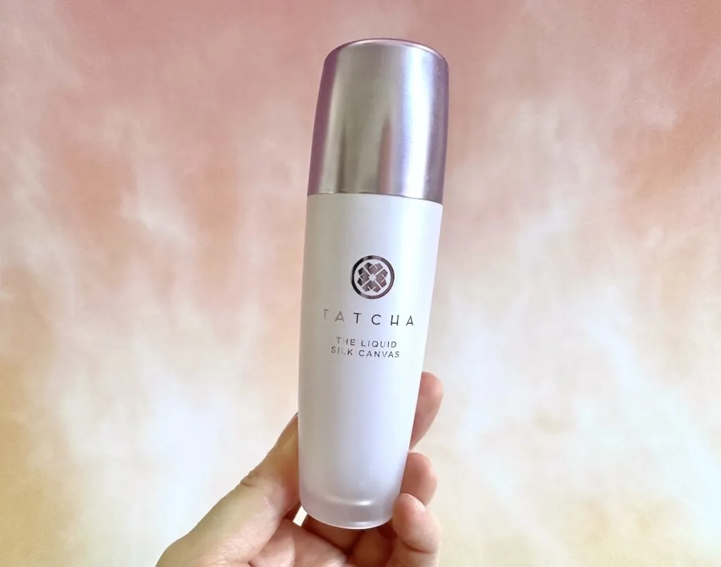 Tatcha The Liquid Silk Canvas Primer, handheld.