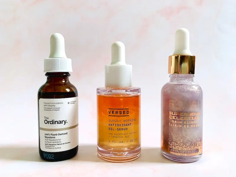 The Ordinary 100% Plant-Derived Squalane, Versed Sunday Morning Antioxidant Oil Serum, and Flower Beauty Supernova Celestial Skin Elixir