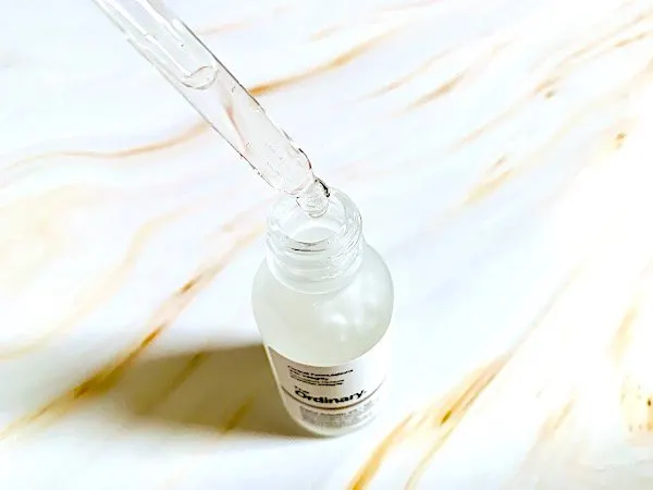 The Ordinary Alpha Arbutin 2% Serum opened with dropper