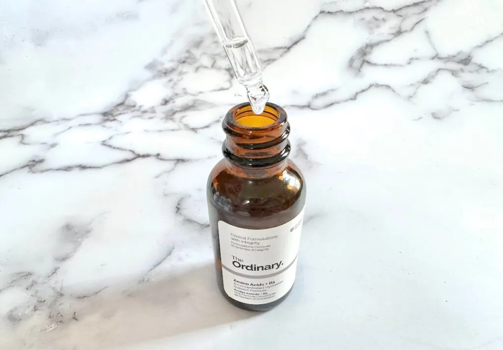 The Ordinary Amino Acids + B5, open bottle with dropper.