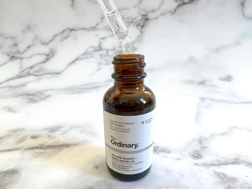 The Ordinary Ascorbic Acid 8% + Alpha Arbutin 2% open bottle with dropper.