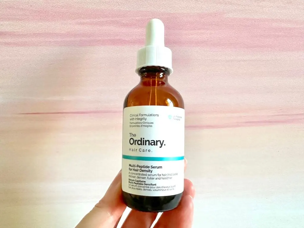 The Ordinary Multi-Peptide Serum for Hair Density, handheld.