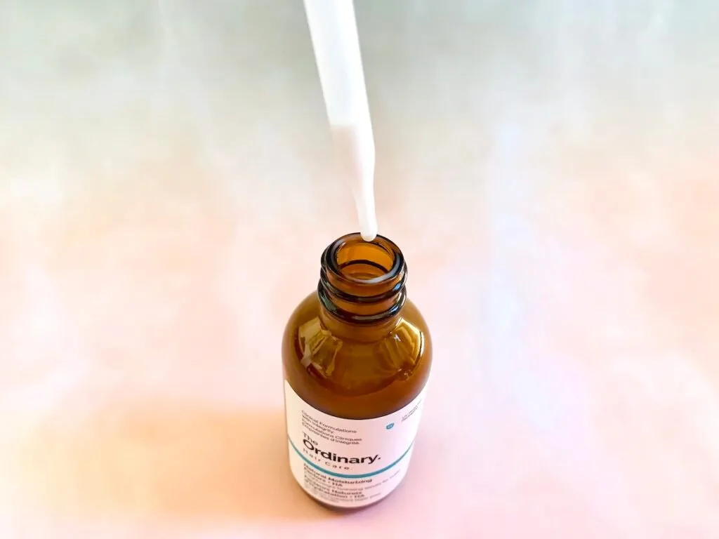 The Ordinary Natural Moisturizing Factors + HA for Scalp opened with dropper