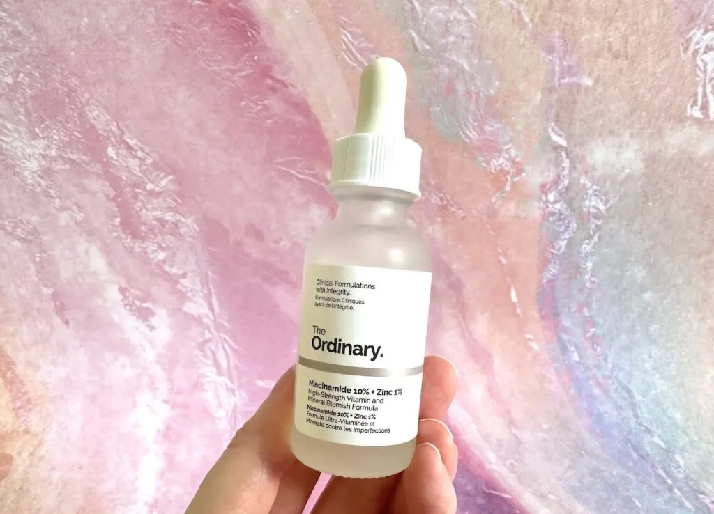 The Ordinary Niacinamide 10% + Zinc 1%, handheld.