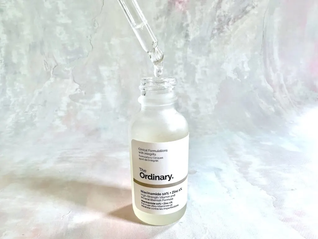 The Ordinary Niacinamide 10% + Zinc 1% open bottle with dropper.