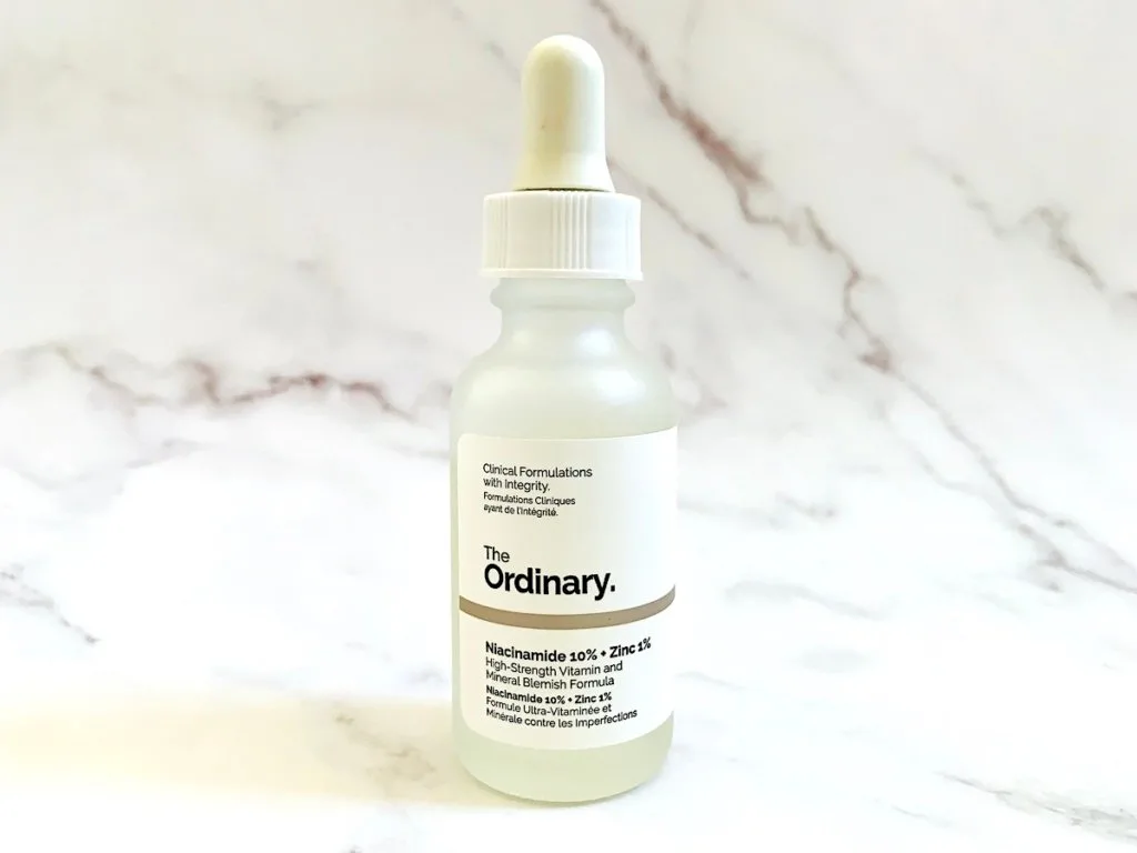 The Ordinary Niacinamide 10% + Zinc 1% on marble background