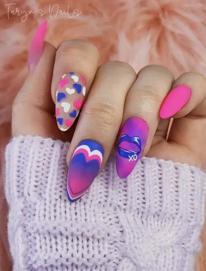 Pink, purple, and blue Valentine's nails.