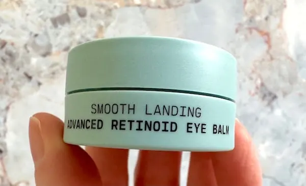 Versed Smooth Landing Advanced Retinoid Eye Balm, handheld.